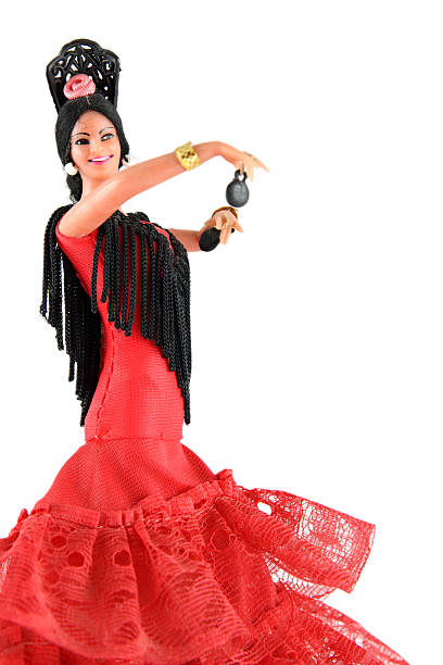 istock Female doll from Spain dancing flamenco on a white background 144332265