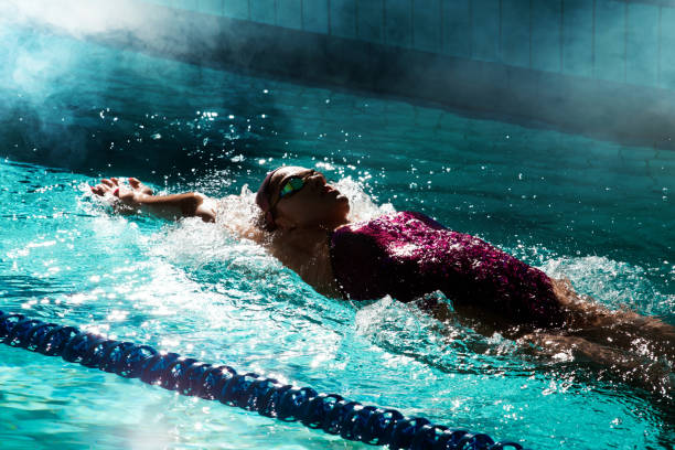 istock Young woman swimmer training in the pool. 1443322704