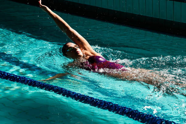 istock Young woman swimmer training in the pool. 1443322781