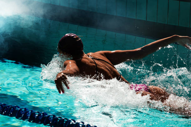 istock Young woman swimmer training in the pool. 1443322818
