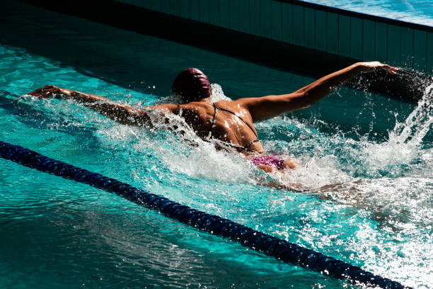 istock Young woman swimmer training in the pool. 1443322947