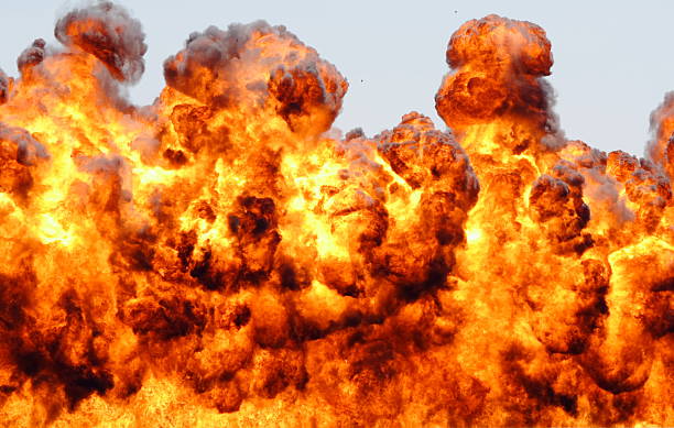istock Large fiery explosion throwing flames skyward 144332444