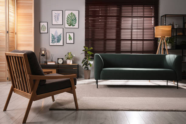 istock Stylish living room interior with comfortable sofa and armchair 1443327079