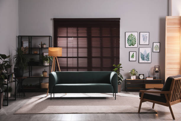 istock Stylish living room interior with comfortable sofa and armchair 1443327116