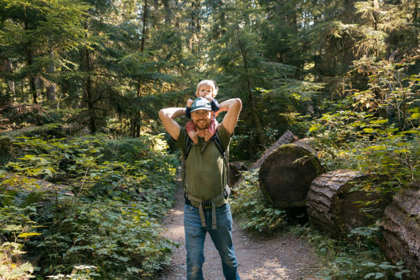 istock Father Hiking With Toddler In Washington State Forest 1443327643