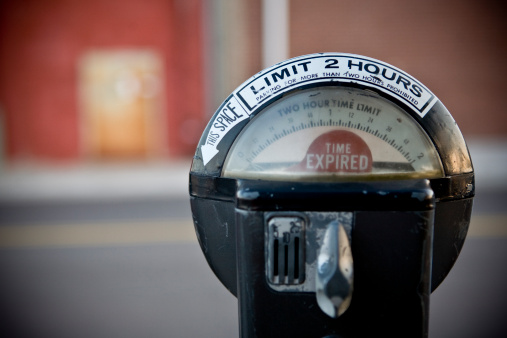 Urban Parking Meter down town in the city. Great for business ads and graphic design.