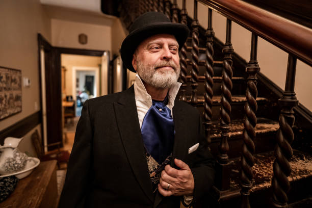 istock Mature man getting dressed for Christmas carolling 1443328244