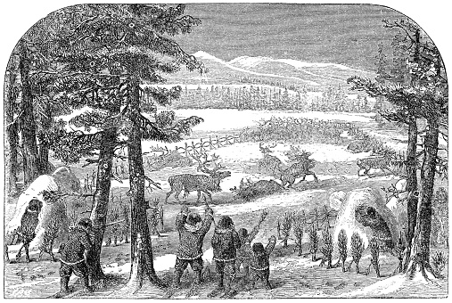 Athabascan people hunting moose with a deer corral fence in Alaska, USA. Vintage etching circa 19th century.