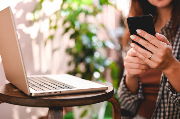 istock woman texting on smartphone close up with selective focus. 1443329024