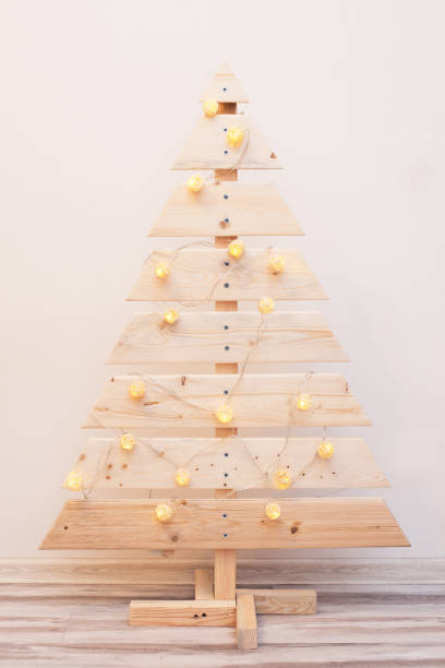 istock Christmas tree hand made wooden in scandinavian style. 1443329849