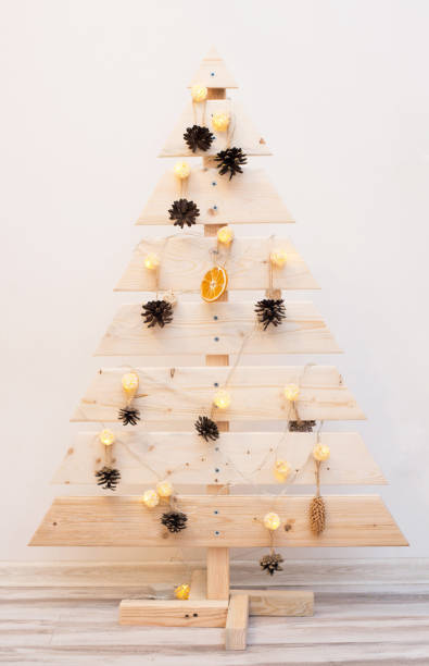 istock Christmas tree hand made wooden in scandinavian style. 1443329851
