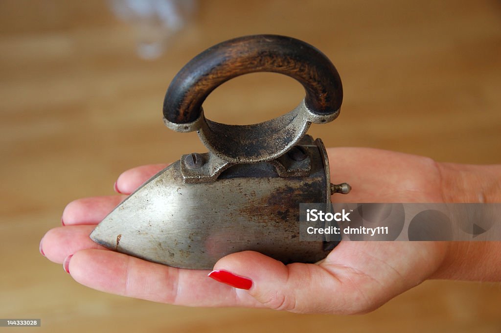 The antiques iron The small antiques flat iron Antique Stock Photo