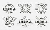 istock Baseball emblems, symbols, badges templates. Set of 6 baseball symbols. Baseball emblems with bats and ball isolated on white background.  Baseball team vector emblems 1443330533