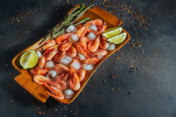istock raw shrimp with ice and lemon on a platter 1443332889
