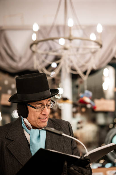 istock Mature man practising singing for Christmas carolling 1443334469