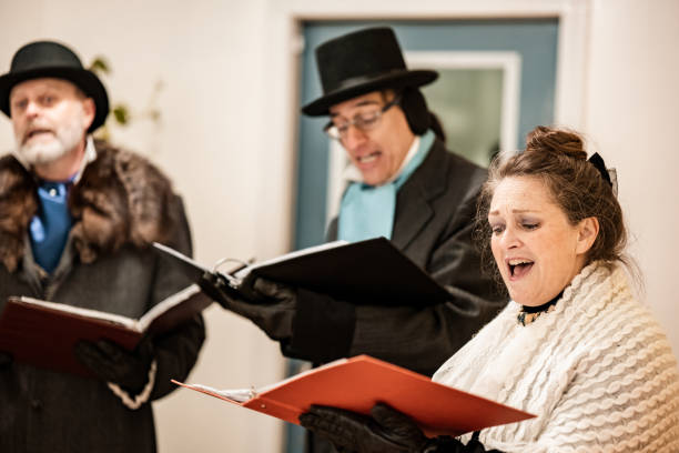 istock Mature people practising singing for Christmas carolling 1443334502