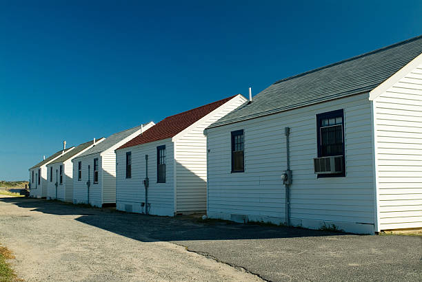 Row of white beach cottages Duplex beach cottages on Cape Cod majkav stock pictures, royalty-free photos & images