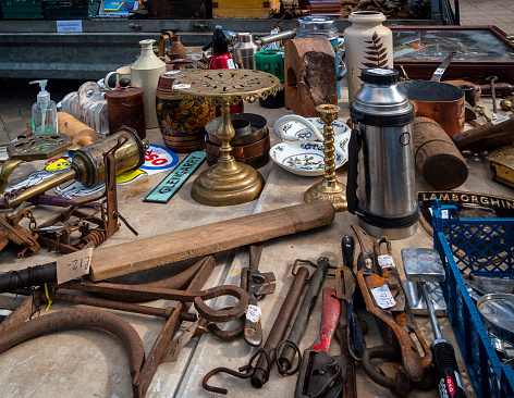 A collection of bric-a-brac for sale on a stall in the market in Swaffham, Norfolk, Eastern England.
