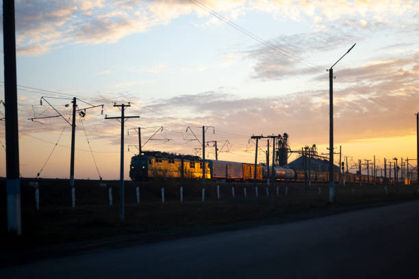 The evening train leaves at sunset. Old trains. High quality photo