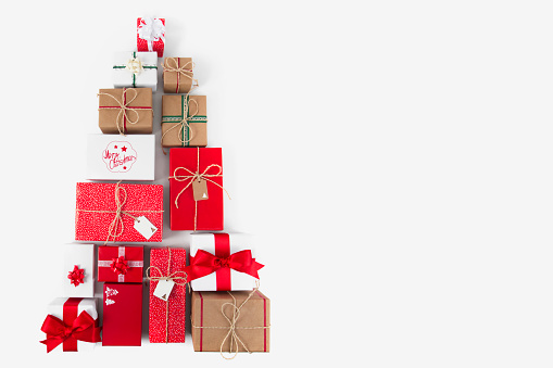 Conceptual Christmas tree still life with gift boxes