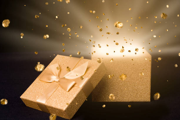 istock golden box light gold glitter particel 1443338063