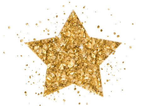 Star and golden particles white background, copy space