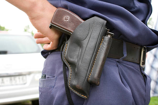 istock Police officer`s holster with gun. 144333977