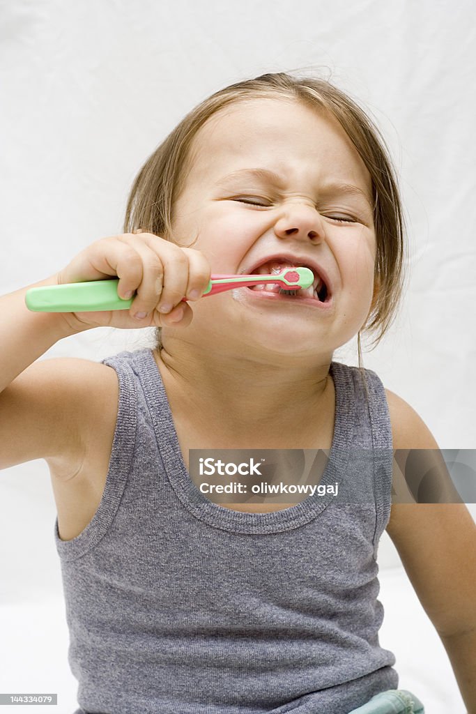 Teeth brushing little girl brushing her teeth Beautiful People Stock Photo