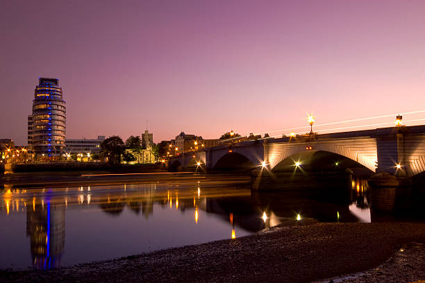 Putney Bridge @ Sunset Putney Bridge at sunset with some light trails from a boat and bus putney photos stock pictures, royalty-free photos & images