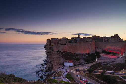 illuminated old town of Bonifacio in Corsica perched on the cliffs
