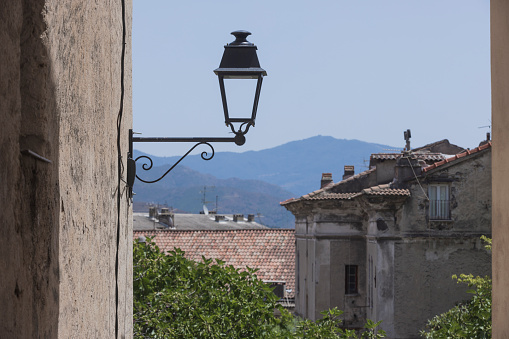 houses in the center of Corte, a village in Haute-Corse; Corte, France