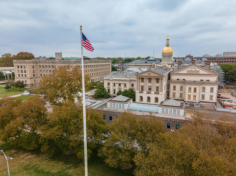 Aerial view of the New Jersey State Capitol Building in Trenton with American Flag