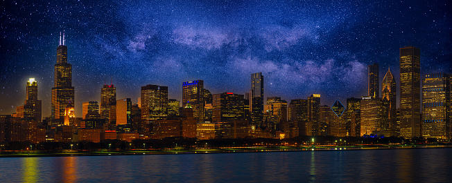 Composite panoramic photograph nofmthe Chicago, Illinois skyline with the Milkyway.