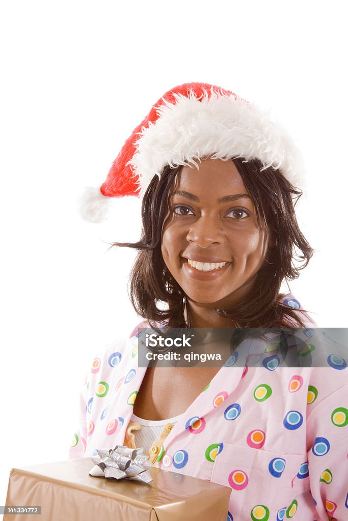 Рождество утром, счастливый Черные женщина PJ's с подарок Колпак Санта Клауса - Стоковые фото 20-24 года роялти-фри