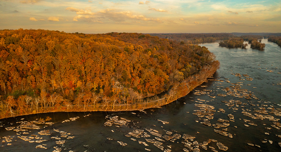 Aerial View of the Potomac River and C&O Canal with Fall Colors at Dusk Sunset in Maryland.