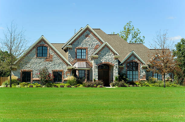 istock Curbside view of a beautiful home 144334968
