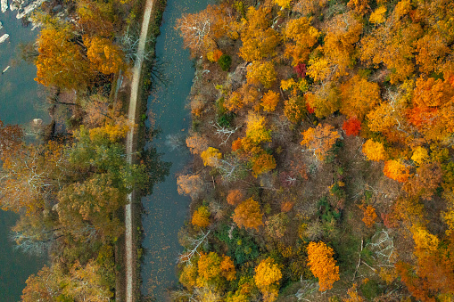 Aerial View of the Potomac River and C&O Canal with Fall Colors at Dusk Sunset in Maryland.