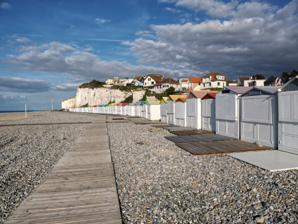 istock Pebble beach and cliffs at Criel sur Mer in France 1443352070