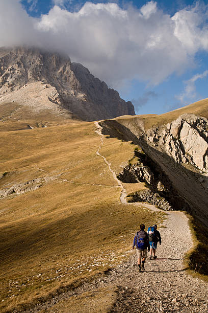 Two hikers in abruzzo, Italy stock photo