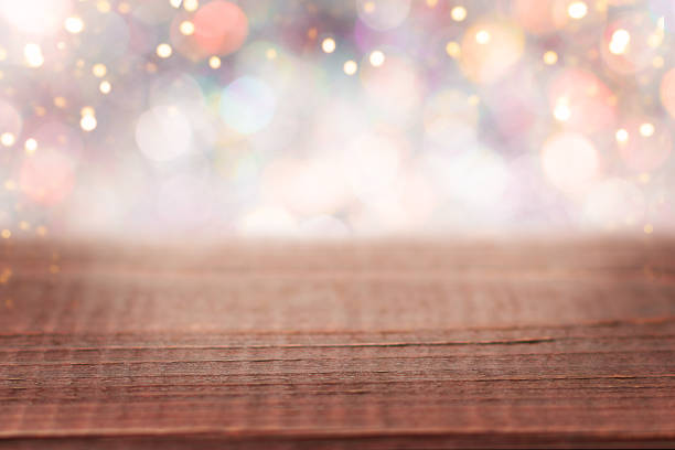 istock Festive wooden background with defocused shiny bokeh lights. 1443361495
