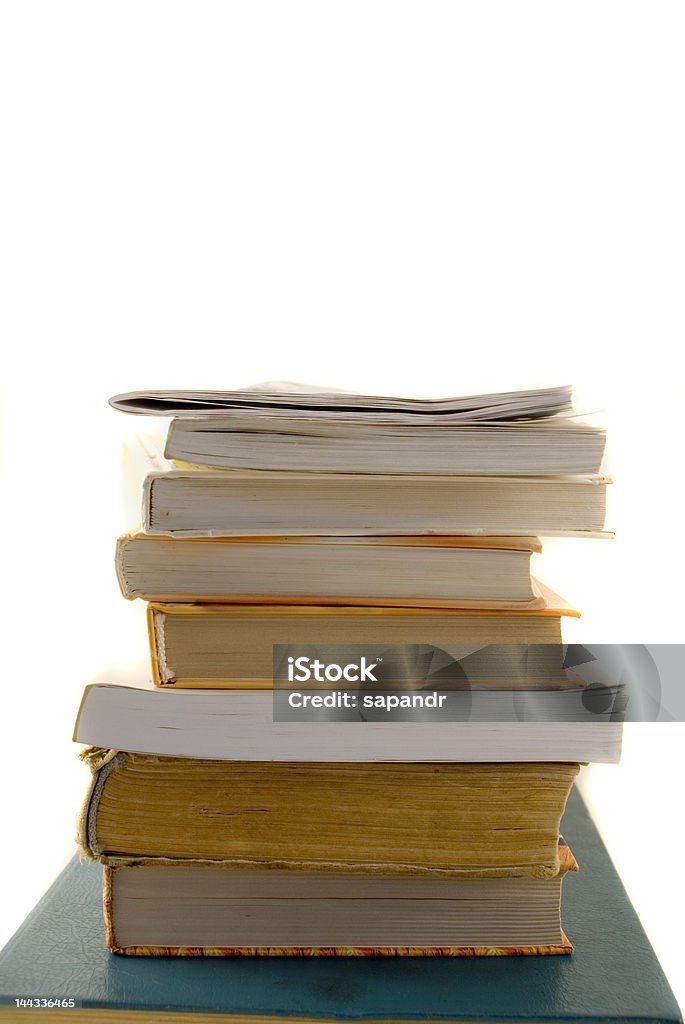 Heap of the book The heap of the book on the white background Antique Stock Photo