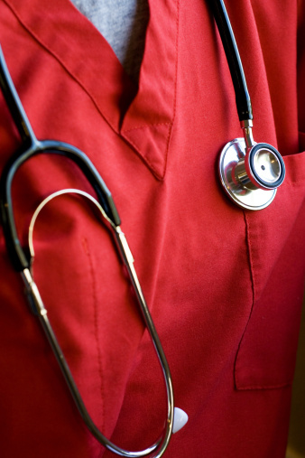 Doctor or Nurse wearing a stethoscope.