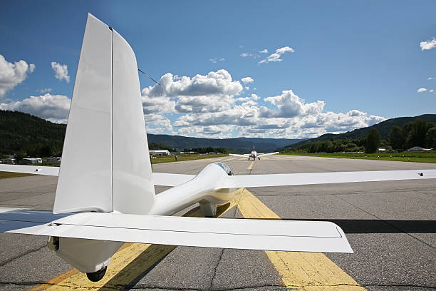 Tow plane and glider ready for take off stock photo