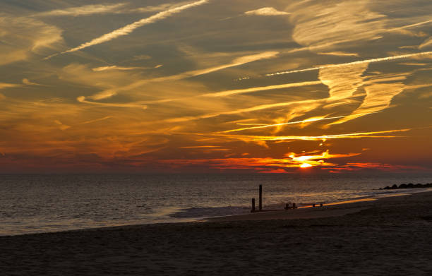 istock Sunset at Cape May Point New Jersey Shore 1443370306