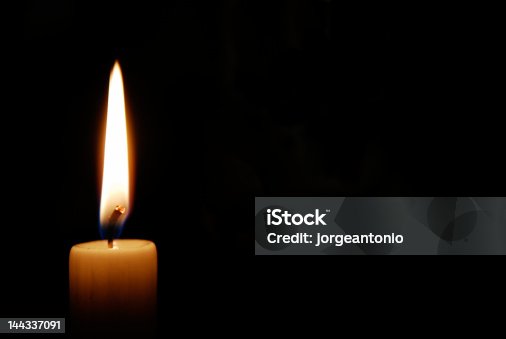 istock Candle in the dark 144337091