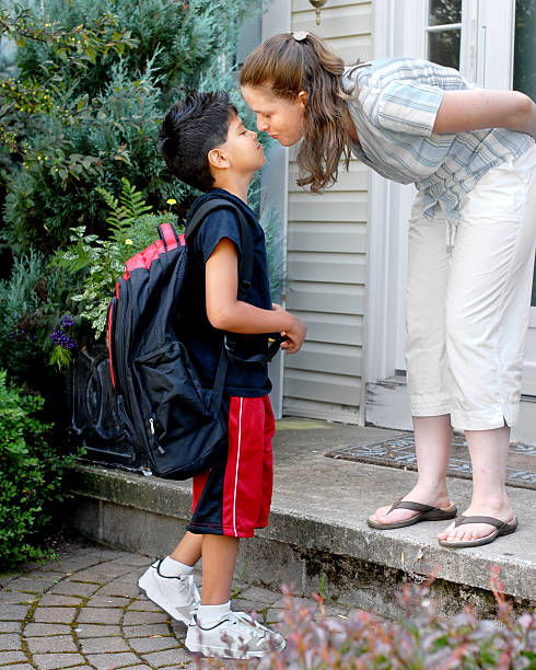 istock Kissing Mommy Good-Bye 144337175