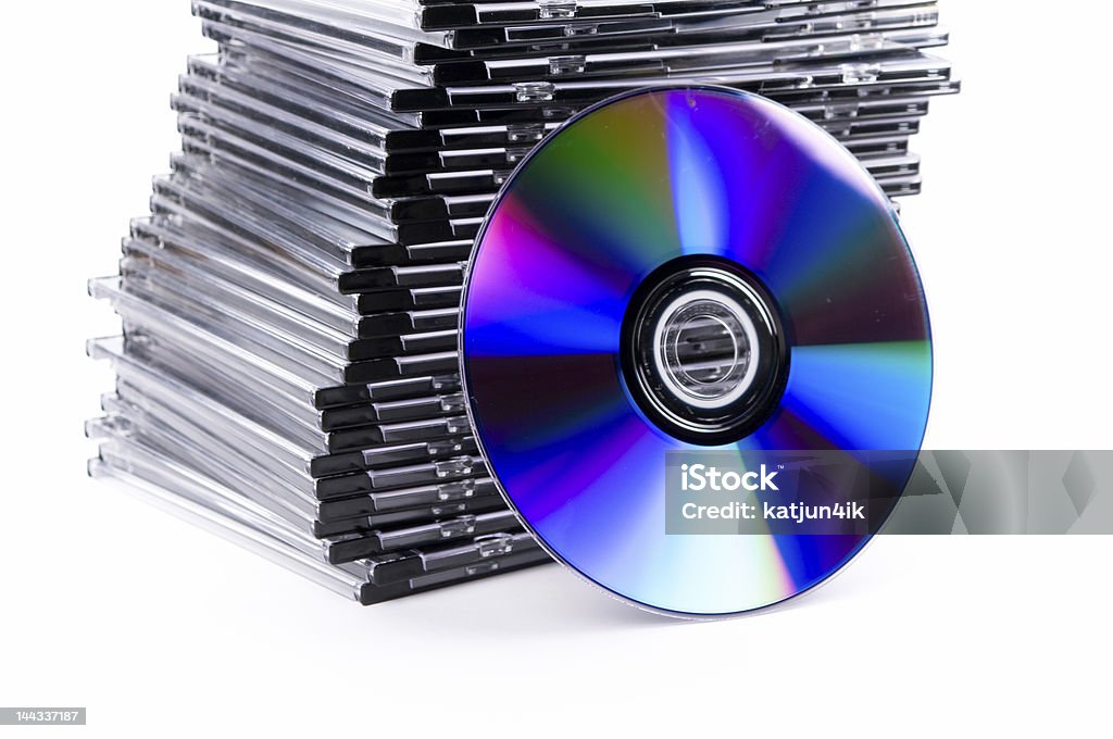 Pilha de caixas de cd-azul com um cd em frente - Foto de stock de CD royalty-free
