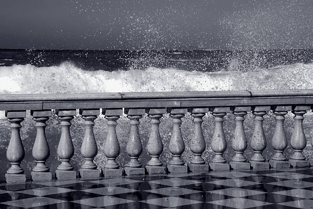 Balcony over a stormy sea in monochrome stock photo