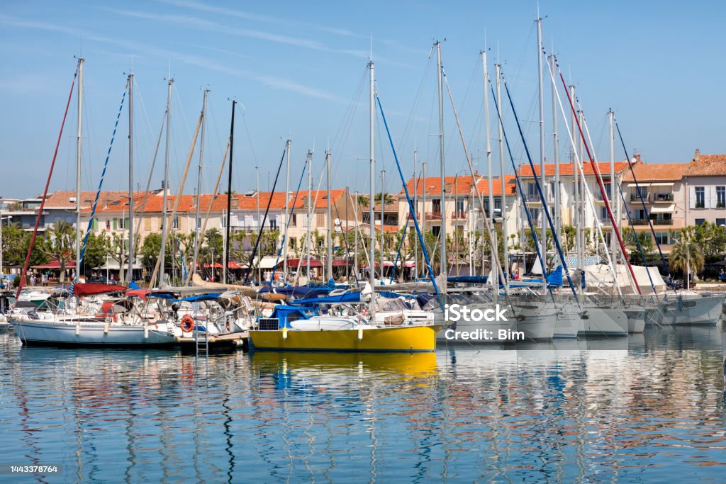 Yachts and Boats at Harbor in Frejus, Cote d'Azur, French Riviera Yachts in marina of Frejus, Cote d'Azur, French Riviera, France, Europe. Marina Stock Photo