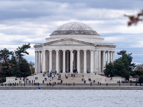 Washington D.C. - March 27 2017: The Jefferson Memorial seen from across the water on an overcast day